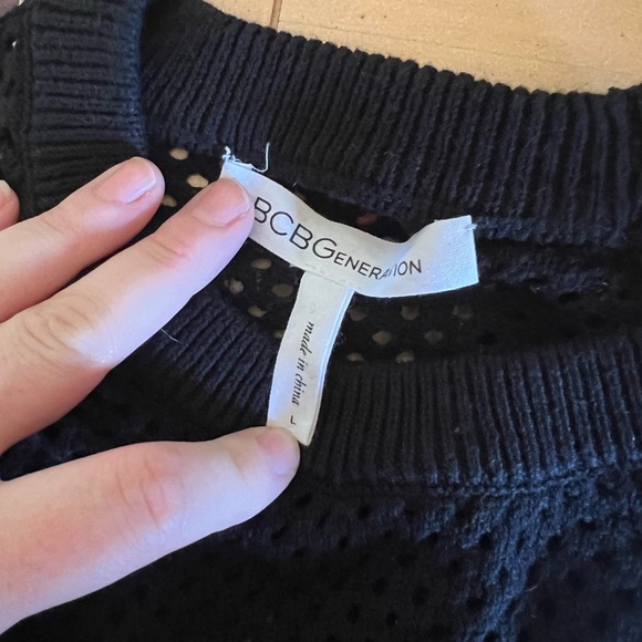 BCBGeneration black open shoulder long sleeve open holes sweater. Size large - Picture 3 of 6